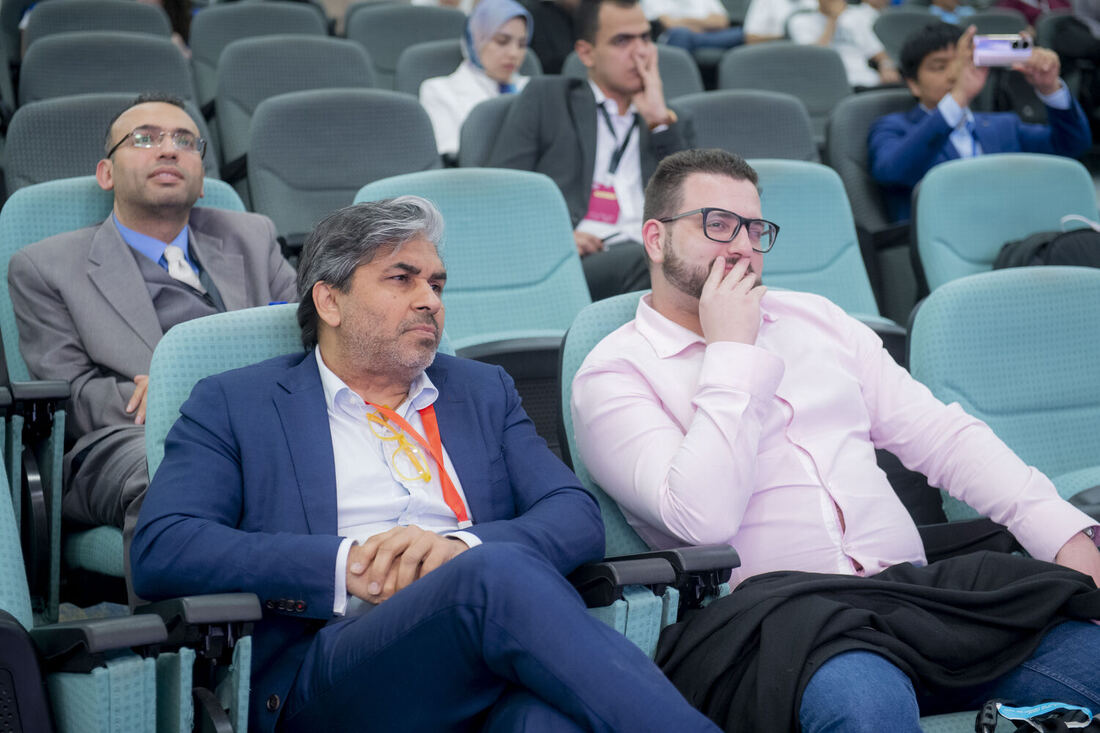 Tarry Singh seated among delegates in the auditorium during another session.