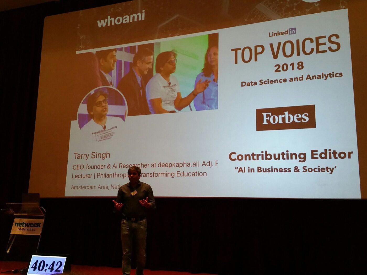 Tarry Singh speaking on stage in front of his opening slide, which lists deepkapha.ai, LinkedIn Top Voices 2018 for data science and analytics, and Forbes contributing editor. A countdown clock at the stage edge reads 40:42.